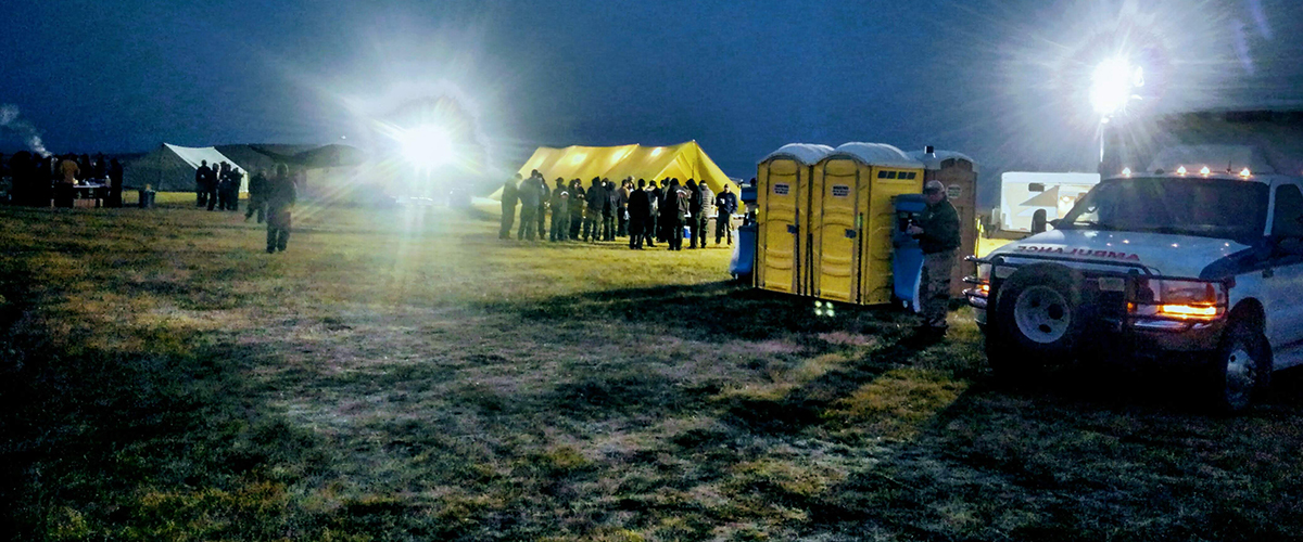 ambo at remote worksite at night